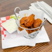 Boneless Wings  · 6 Pieces of Marinated Boneless Wings, breaded and fried, Served plain or tossed in your choi...