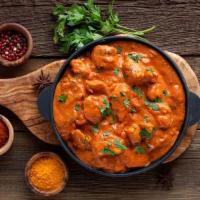 Butter Chicken-Boneless · Chicken breast cooked in onion-tomato sauce and finished with cream and mild Indian spices.