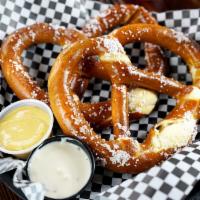 Pub Pretzels · Two soft pretzels served with honey-mustard and spicy queso