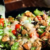 House Salad · Mixed greens, tomato, onion, cucumber, pomegranate-lime vinaigrette