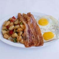 Breakfast Platter · 2 eggs any style, choice of ham, bacon or sausage with home fries and toast.