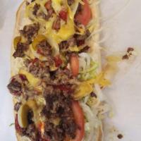 Chopped Cheese · Grilled chop meat, grilled onions
smothered in melted american cheese with lettuce & tomatoe...