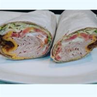 G. Turkey Wrap · Crispy bacon, American cheese, lettuce, tomatoes and mayo.