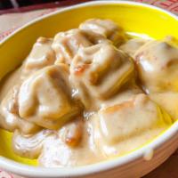 Pumpkin Tortellini  · Comes with walnut honey cream sauce. Vegetarian.