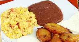 Desayuno Chapin · Scramble eggs, sweet plantains, cheese, sour cream and fried beans.