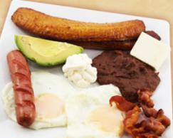 Desayuno El Paraiso · Fried eggs, beans, cheese, sweet plantains, sour cream, bacon, sausage and tortillas.