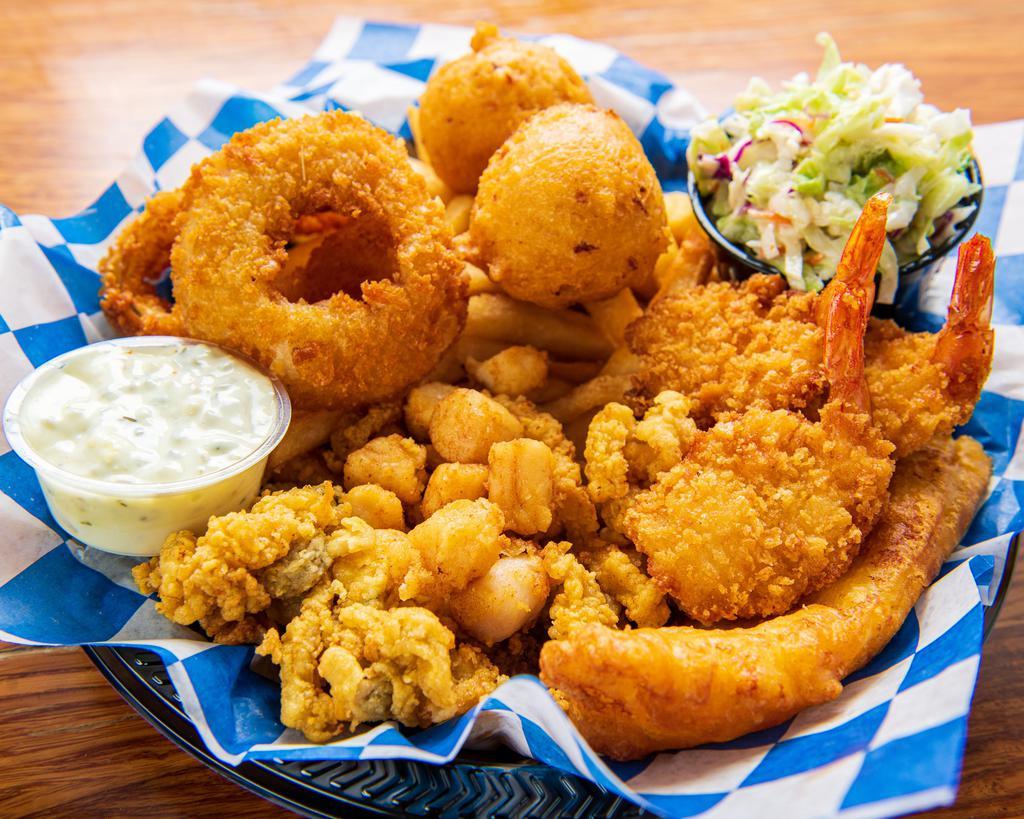 Fried Seafood Platter  · Fried Fish, Whole Clams, Clam Strips, Shrimp, Bay Scallops, Fries and Coleslaw. 