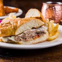 Philly Cheese Steak Sandwich · Seasoned beef, onions, pepper, white American cheese, long soft
roll and fries.