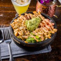Burrito Bowl · With your choice of protein, steamed white rice, beef chilly,
corn, pico, jalapeno, guacamo...