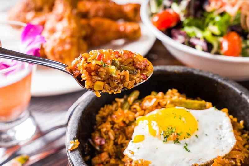 Kimchi Fried Rice · Pan-fried white rice with kimchi, sausage(pork), vegetable and
sunny side up egg