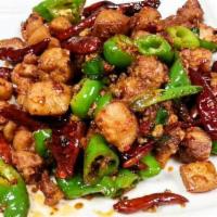 76. Stir-Fried Chicken with Spicy Capsicum · Hot and spicy.