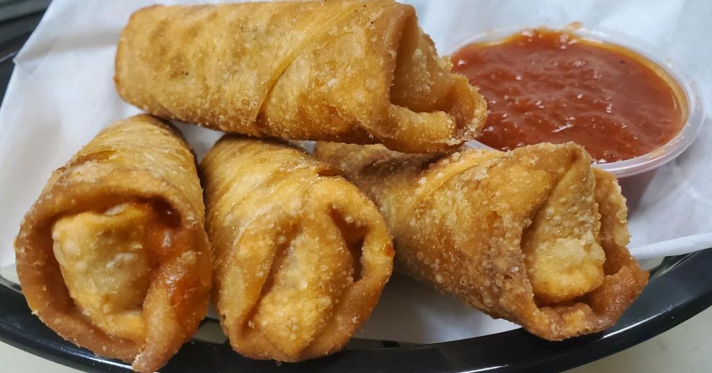 Pizza Logs · Pepperoni and cheese deep fried in flaky dough, served with marinara sauce.