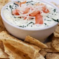 Spinach  Dip · A creamy spinach dip mixed with parmesan cheese, cream cheese and topped with provolone and ...