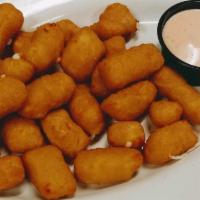 Cheese Curds · Fried Cheese Curds, served with sriracha ranch dipping sauce