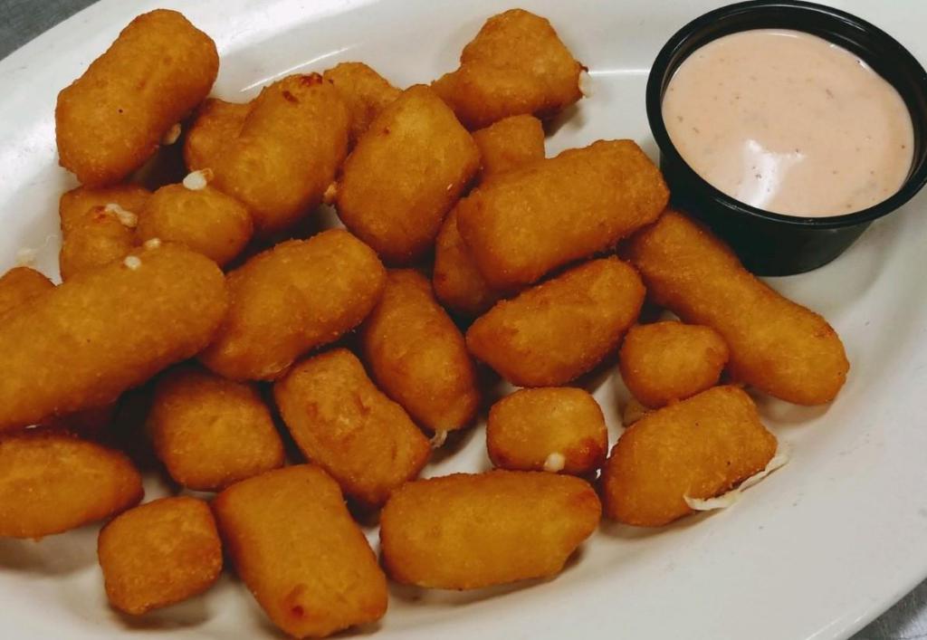 Cheese Curds · Fried Cheese Curds, served with sriracha ranch dipping sauce