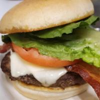 Bacon Cheeseburger · Thick 'n hearty, famous 1/2 lb. burger topped with bacon and choice of cheese. Dressed with ...