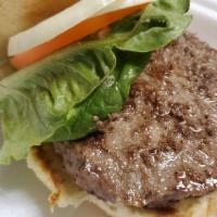 Hamburger · Thick 'n hearty, famous 1/2 lb. burger dressed with lettuce, tomato and onion and served wit...