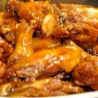 Knuckles Knockout Wings · 10 piece jumbo wings tossed in choice of sauce, served with bleu cheese and celery.