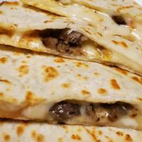 Steak Quesadilla · Grilled flour tortillas filled with melted mozzarella cheese, shaved steak, banana peppers, ...