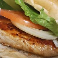 Grilled Chicken Sandwich · Grilled chicken breast marinated in golden Italian dressing. Topped with lettuce, tomato and...