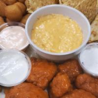 Knockout Platter · Tasty sampling of boneless wings, cheese quesadilla, white cheddar cheese curds, pickle frie...