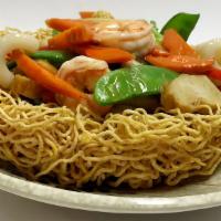 H19. Seafood Pan Fried Noodle · Served with white rice.