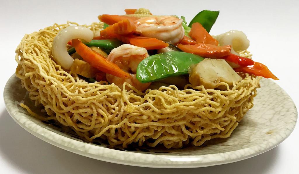 H19. Seafood Pan Fried Noodle · Served with white rice.