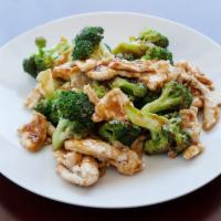 62. Chicken with Broccoli · Served with white rice.