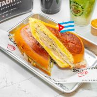 Medianoche  Sandwich · Mustard, swiss cheese, ham, pickles, roasted pork, QUE RICO!