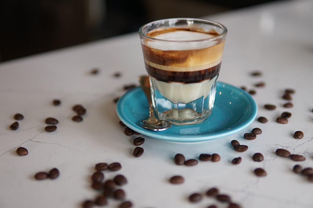Cortadito Leche & Leche  · Espresso with condensed milk, a hint of milk and foam.