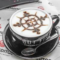 Café Mocha · Full-bodied espresso combined with bittersweet mocha sauce and steamed milk, then topped wit...