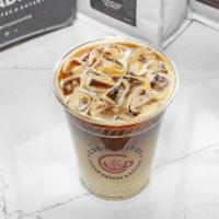 Iced Latte · Cold Milk mixed into espresso on ice.