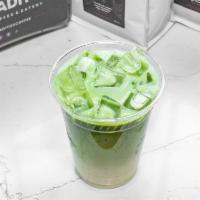 Iced Matcha Latte · Tea-based beverage combining vivid green matcha tea powder and milk to create a smooth, crea...