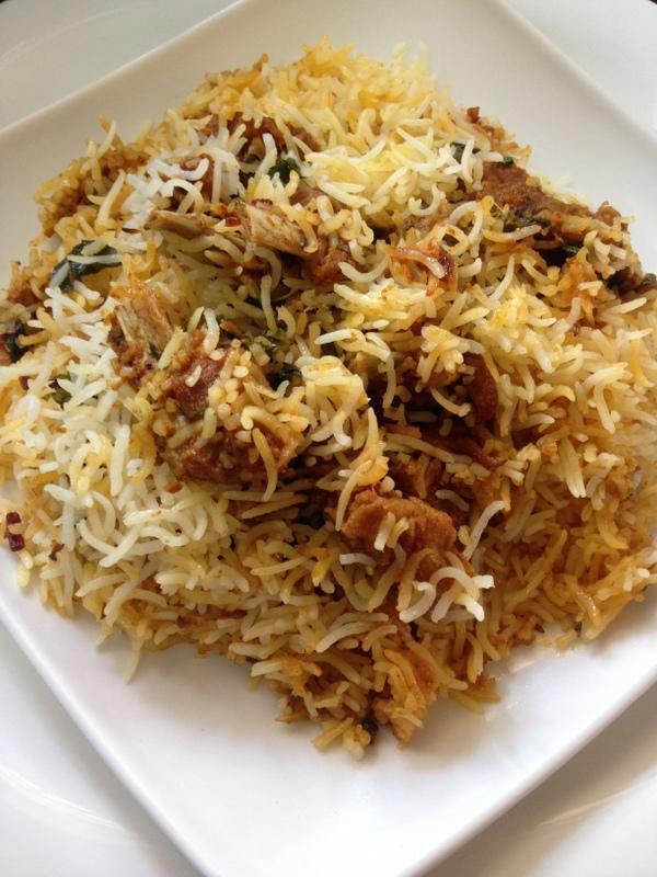 Goat Biryani · Goat and saffron rice in biryani herbs served with raita. One of the most popular items on the menu!