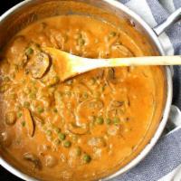 Mushroom Matar · Mushroom and green peas cooked in creamy tomato sauce and Indian spices.