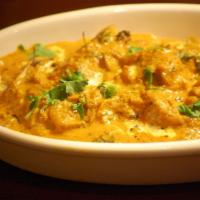 Chicken Korma · Chicken Korma is a mildly spiced Indian dish with a thick sauce, often featuring nuts such a...