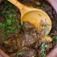 Goat Vindaloo · Very popular Indian dish with gravy and Goat meat.