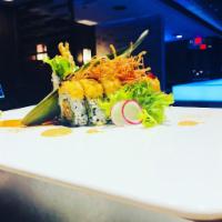 Crab Shack Roll · Tempura soft shell crab, cucumber, lettuce, mayo and cream cheese rolled inside, topped with...
