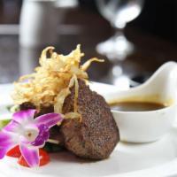 Soy Ginger Filet Mignon · Grilled tenderloin and asparagus. Served with Japanese soy ginger sauce, garnished with frie...