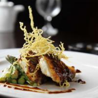 Chilean Sea Bass · Pan seared with asparagus. Served with our homemade soy garlic sauce, garnished with crispy ...