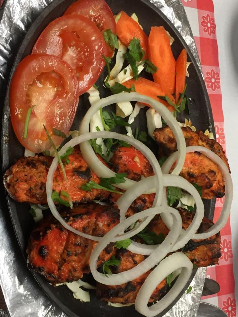 Chicken Tikka Plater · Chicken boneless cubes marinated and baked in clay oven.  Non vegetarian.