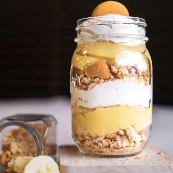 Banana Stacker · Banana pudding layered with real banana, Nilla waferst and whipped cream.  Big enough to share if you dare!