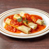 Lasagna · Italian dish made of stacked layers of thin flat pasta alternating with fillings. Layered di...