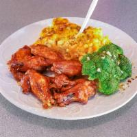 Fried Chicken Wing Ding with 2 Sides · 6 house seasoned chicken wing portions, which includes your choice of sauce and served  with...