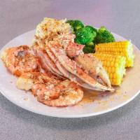 1 Dungeness  Crab Cluster with 3 Jumbo Shrimp Combo · Includes your choice of 2 sides.