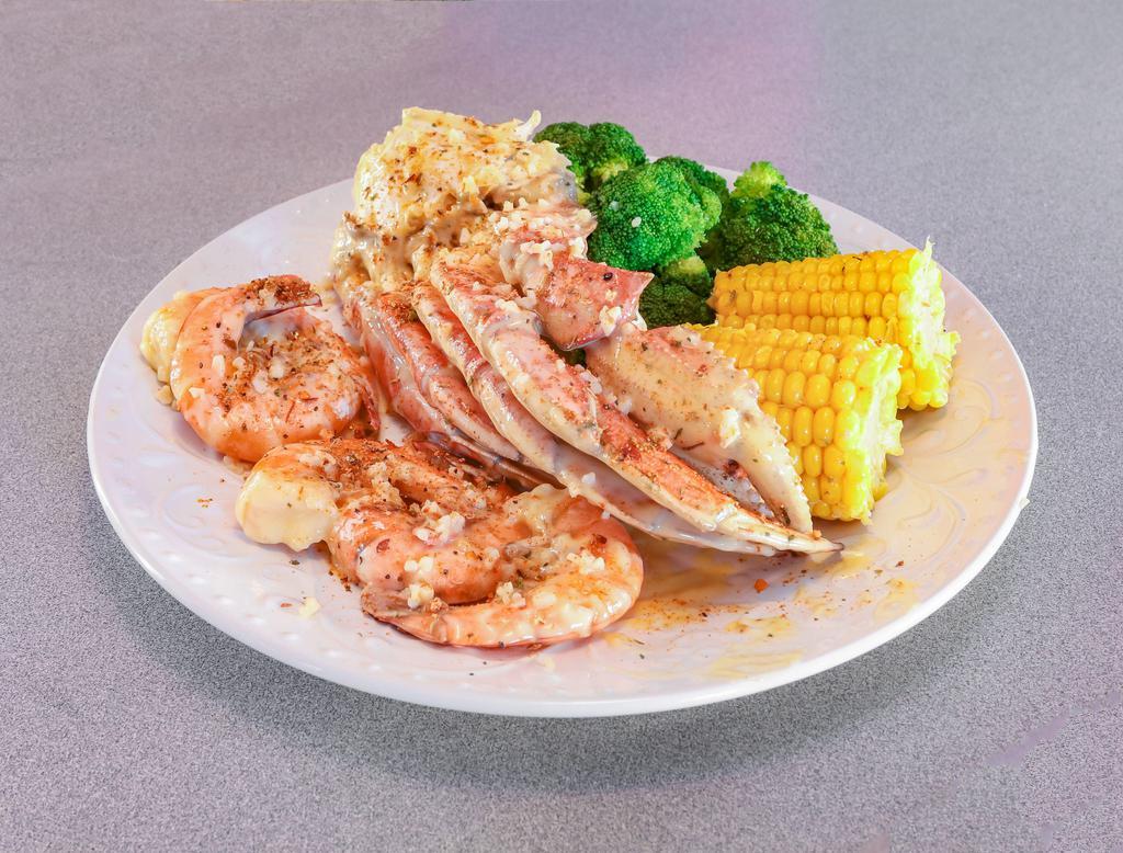 1 Dungeness  Crab Cluster with 3 Jumbo Shrimp Combo · Includes your choice of 2 sides.