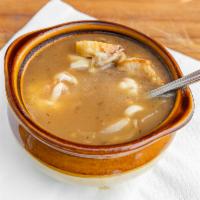 Onion Soup 12 oz. · Traditional soup with Swiss cheese and bread.