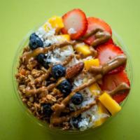 2. Ultimate Acai Bowl · House made Granola, Mango, Strawberry, Blueberry, Almond Butter, Coconut Flakes and Chia see...