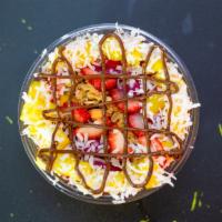 5. Coco-Loko Pitaya Bowl · Granola, mango, strawberry, pineapple, Nutella and coconut flakes.