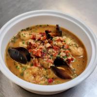 Seafood Creole · Scallops, Shrimp & Mussels In A Creole Sauce Over Cheddar & Pepperjack Grits